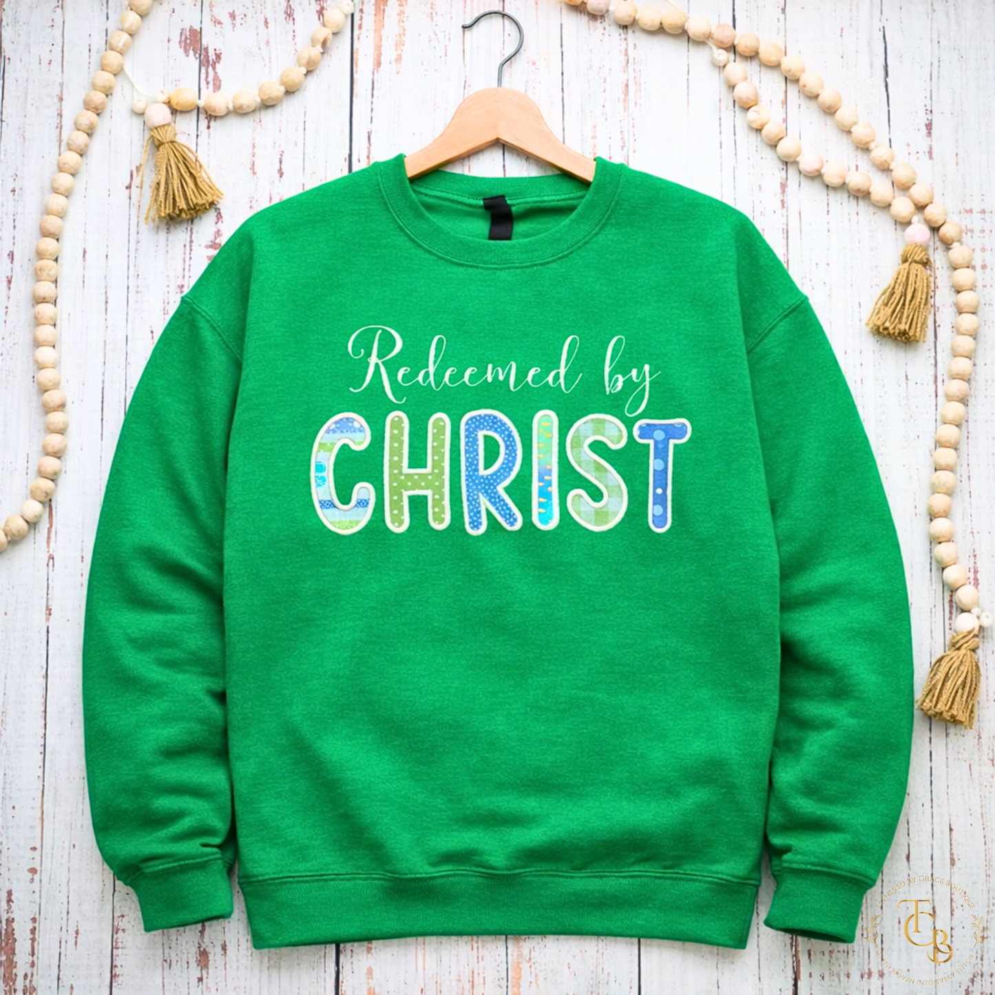 Redeemed by Christ Premium Appliqué Crewneck Sweatshirt – Embroidered Christian Boutique Pullover