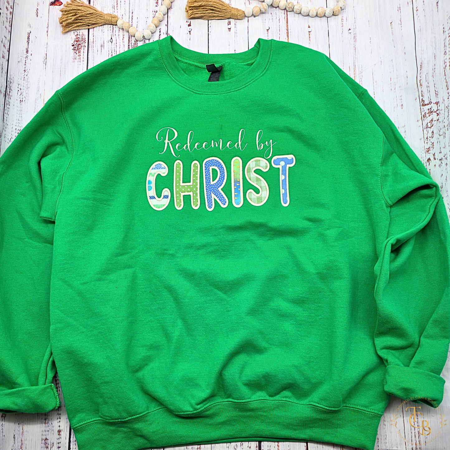 Redeemed by Christ Premium Appliqué Crewneck Sweatshirt – Embroidered Christian Boutique Pullover