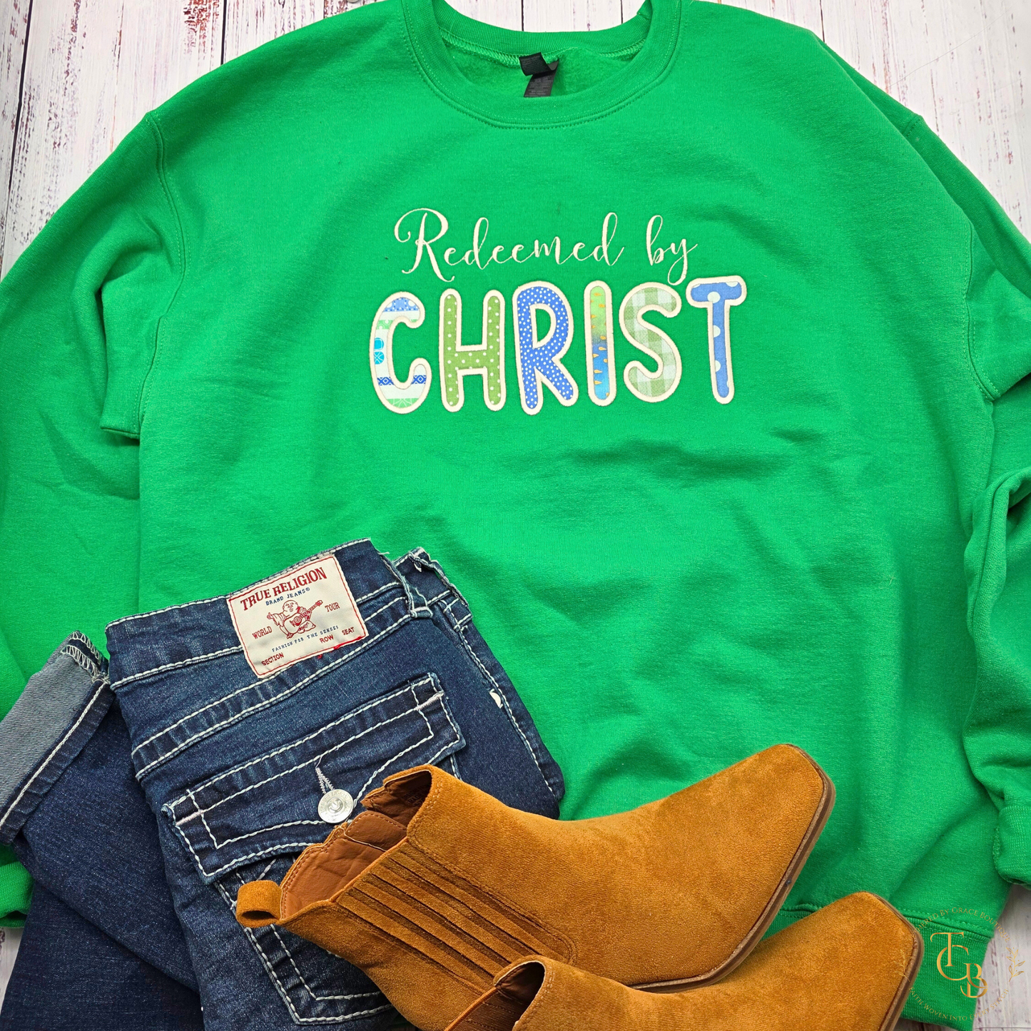 Redeemed by Christ Premium Appliqué Crewneck Sweatshirt – Embroidered Christian Boutique Pullover