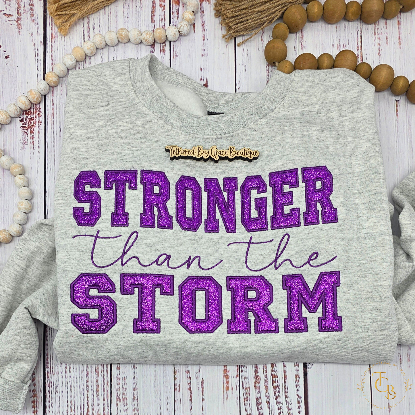 Stronger Than the Storm Embroidered & Appliqué Crewneck Sweatshirt – Inspirational Christian Boutique Pullover